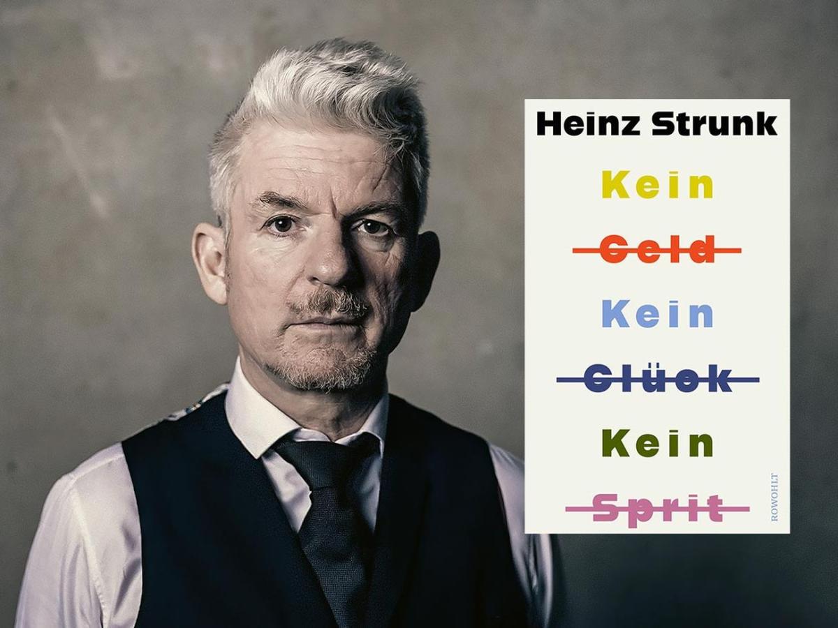 Heinz Strunk mit Buchcover "Kein Geld Kein Glück Kein Sprit"